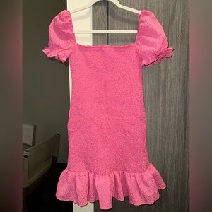 Pink ruffle mini dress.